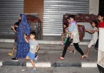 غزة: مواطنون يخلون منازلهم بسبب تهديدات الاحتلال
