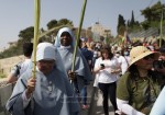 المسيحيون الفلسطينيون يحضرون أحد الشعانين بمدينة القدس
