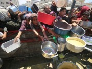 نازحة تعجز عن توفير الطعام لأطفالها بعد توقف التكية
